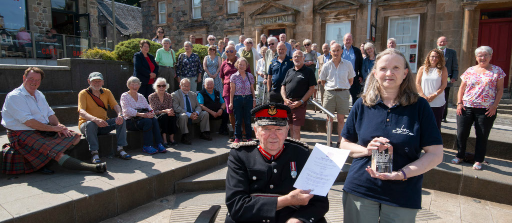 Cameron of Lochiel presents West Highland Museum with their Queen’s Award for Voluntary Service